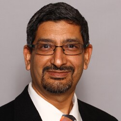 Dr Raman Danra headshot