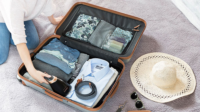 Pogniecione ubrania w walizce – Jak je składać?