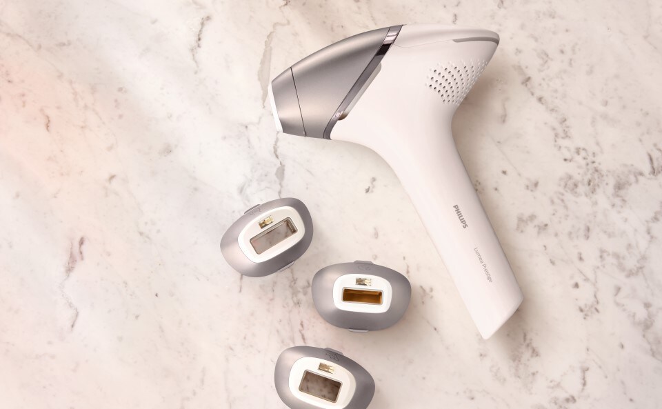 Depilator Philips Lumea z wymiennymi końcówkami.