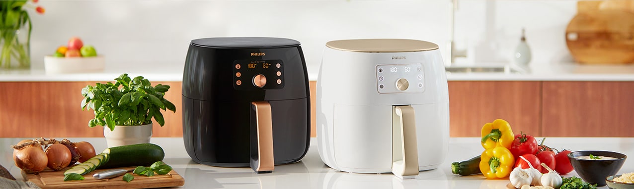 Dwa Philips Ovi Smart stojące na kuchennym blacie